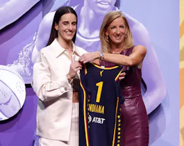 Caitlin Clark poses with WNBA Commissioner Cathy Engelbert as we look at the latest WNBA Championship odds