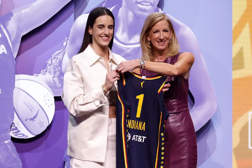 Caitlin Clark poses with WNBA Commissioner Cathy Engelbert as we look at the latest WNBA Championship odds