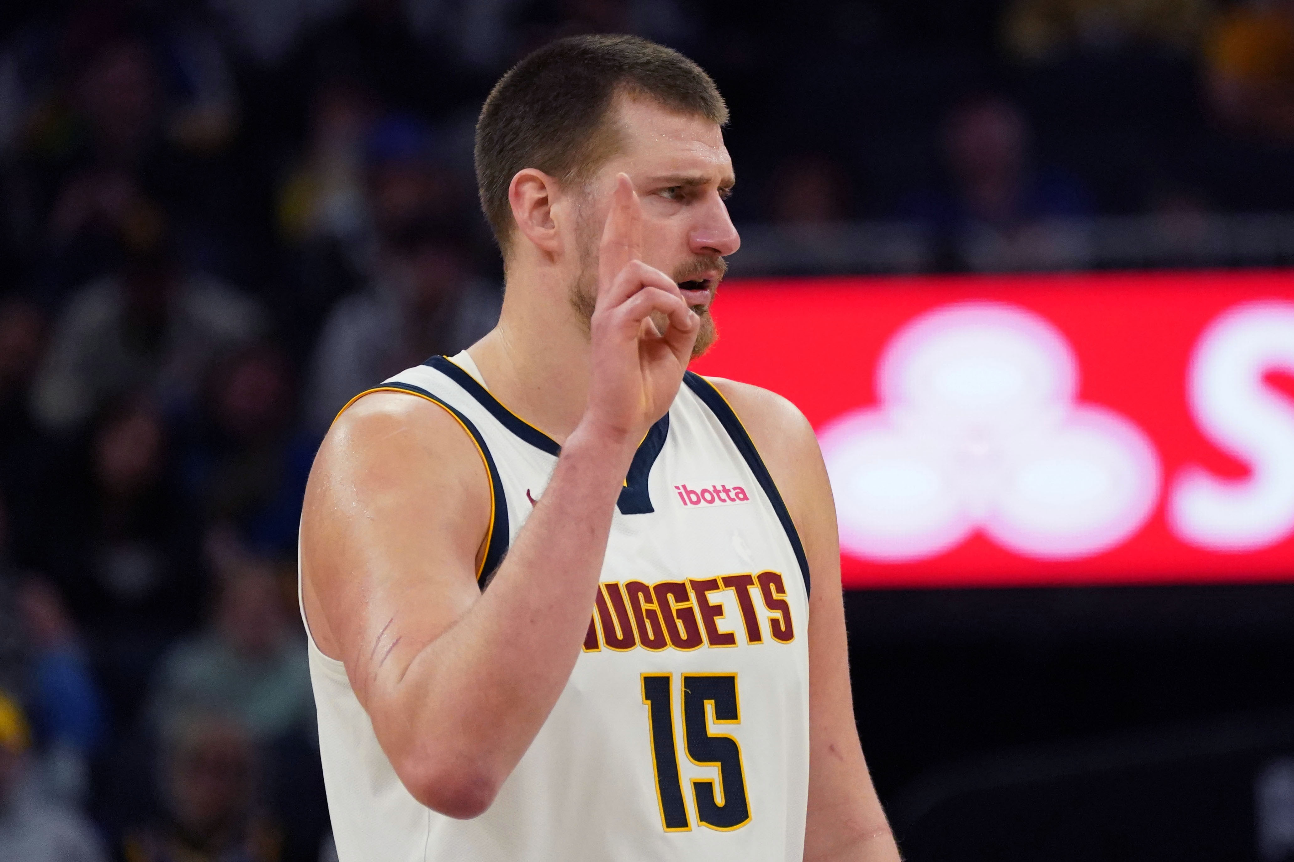 Denver Nuggets center Nikola Jokic (15) waits for play to resume as we break down our NBA Play of the Day.