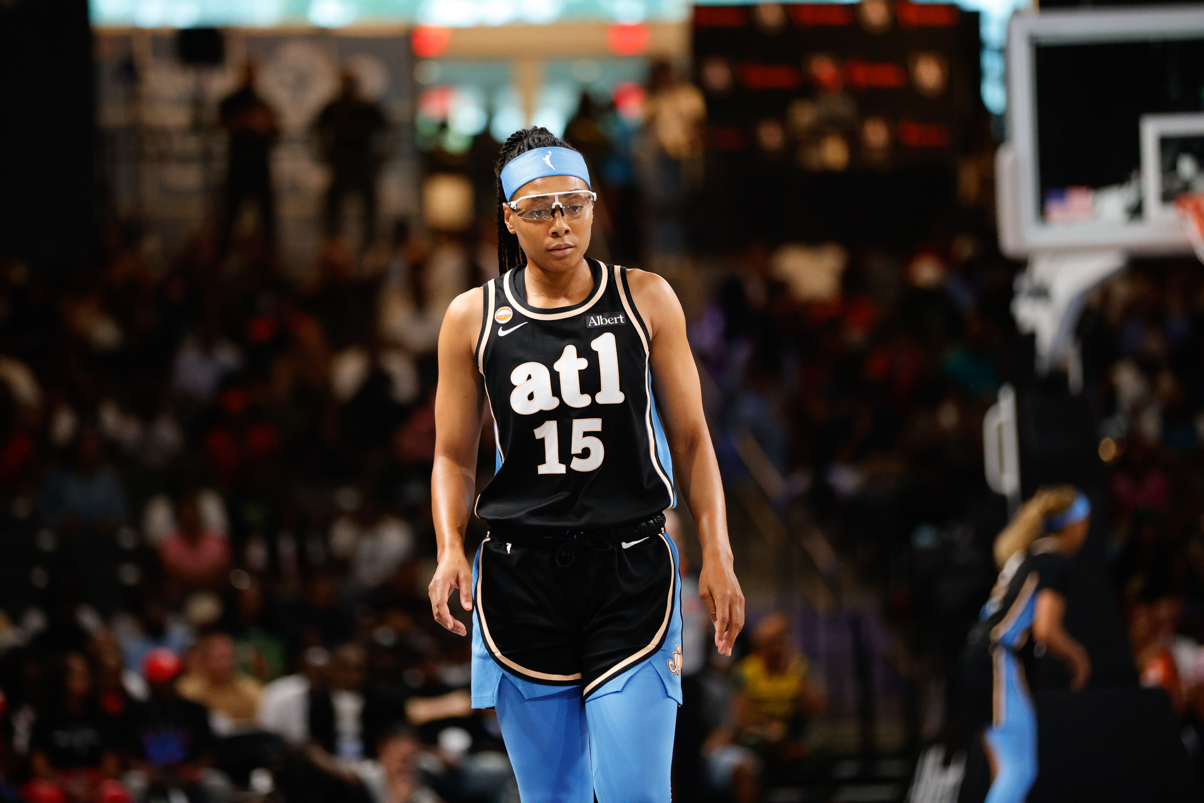 Atlanta Dream guard Allisha Gray (15) looks on as we break down our Tempo vs. Dream prediction.