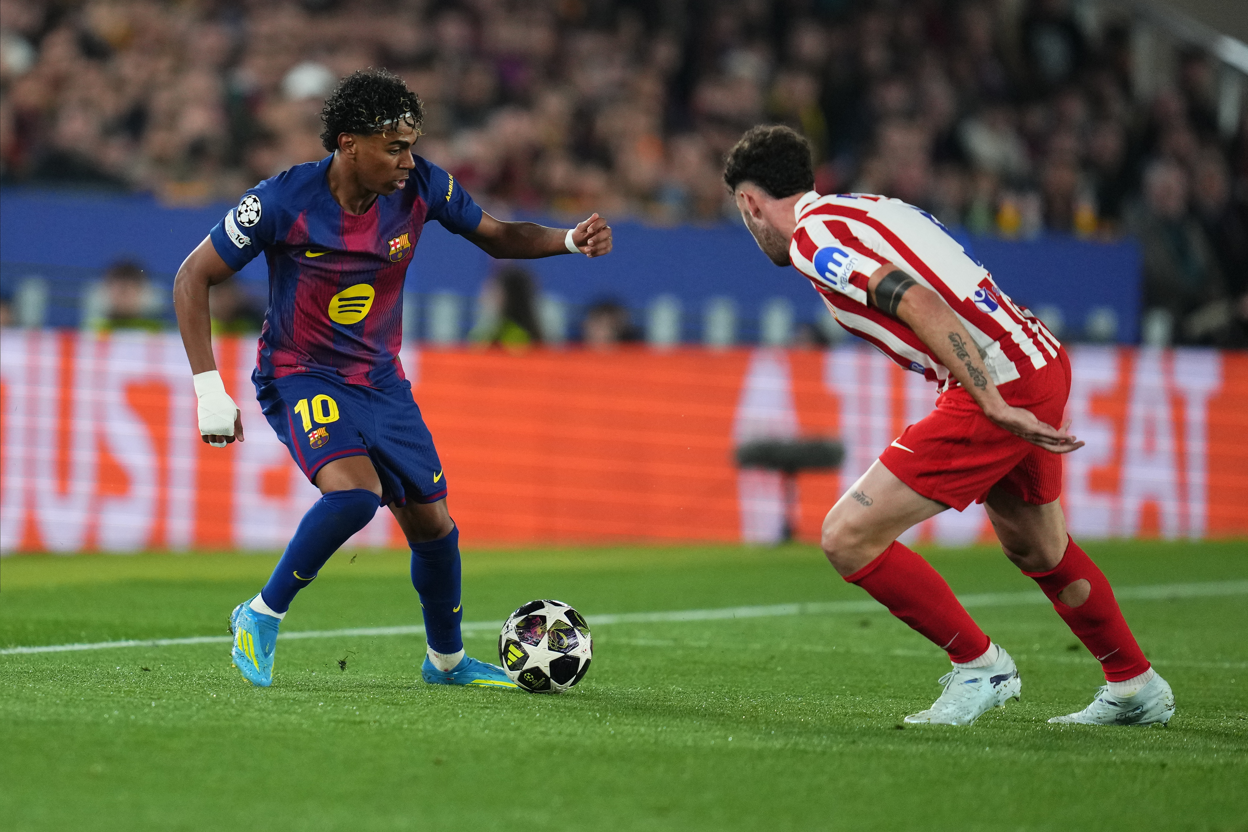 Lamine Yamal of FC Barcelona and Matteo Ruggeri of Atletico de Madrid as we make our best Atletico Madrid vs. Barcelona prediction