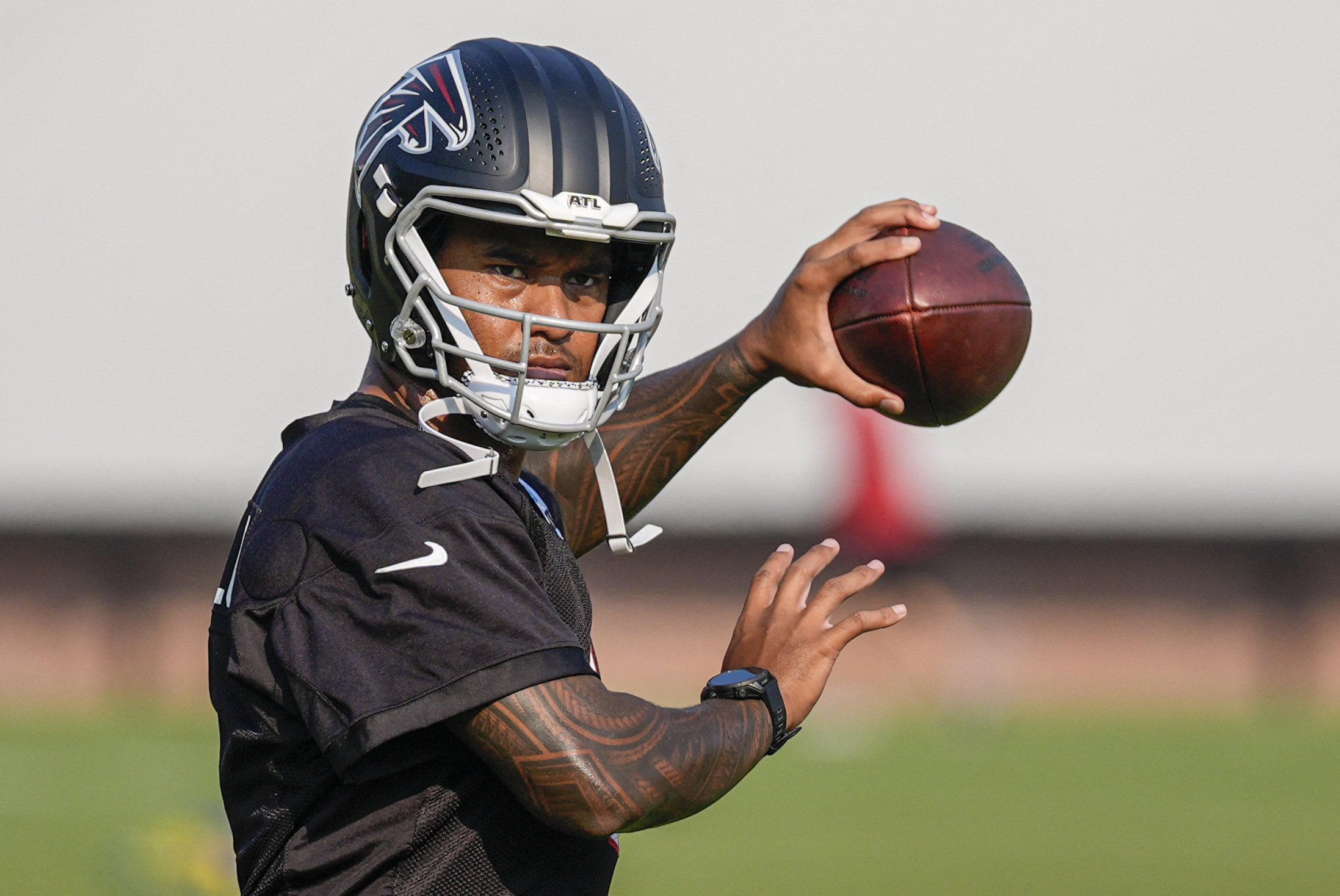 Atlanta Falcons quarterback Tua Tagovailoa shown on the field during training camp as we make our best Broncos vs. Falcons prediction