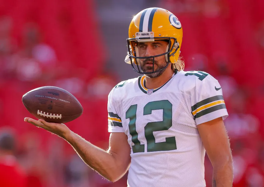 Aaron Rodgers #12 of the Green Bay Packers participates in pregame warmups prior to the preseason game against the Kansas City Chiefs at Arrowhead Stadium on August 25, 2022 in Kansas City, Missouri.