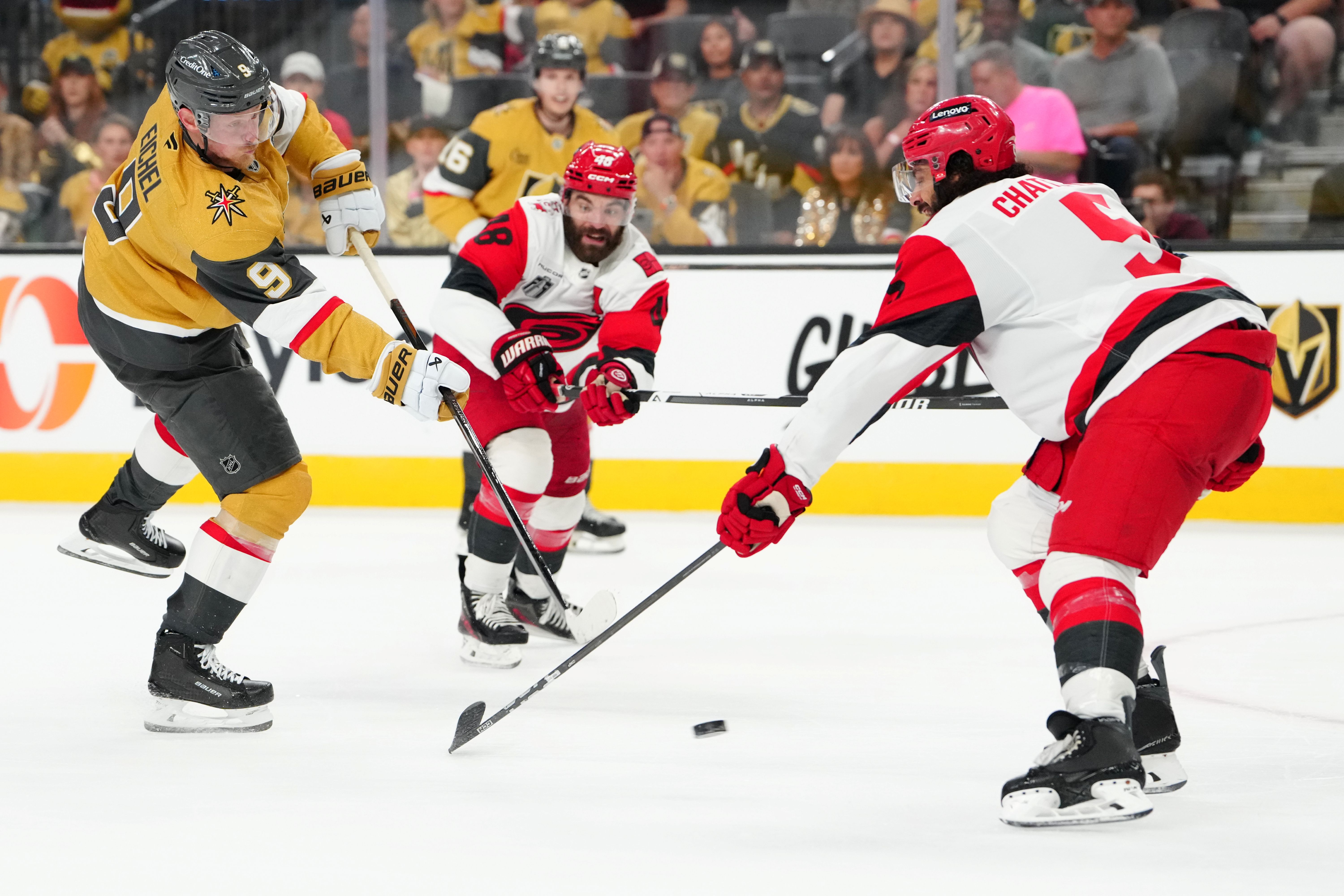 Golden Knights Jack Eichel is defended by Hurricanes Jordan Martinook as we make our best Hurricanes vs. Golden Knights prediction.