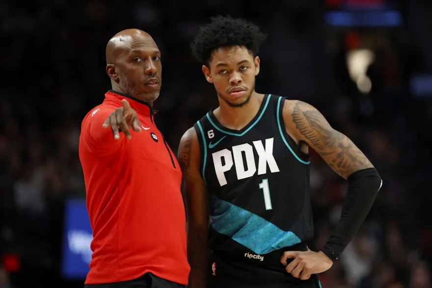 Head coach Chauncey Billups of the Portland Trail Blazers talks with Anfernee Simons during the third quarter against the Brooklyn Nets