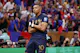 France forward Kylian Mbappe celebrates after scoring a goal against Argentina as we predict the group winners and the teams that will advance into the knockout phase. 