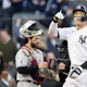 Aaron Judge of the New York Yankees reacts after hitting a home run against the Cleveland Guardians during the second inning in Game 5 of the American League Division Series.