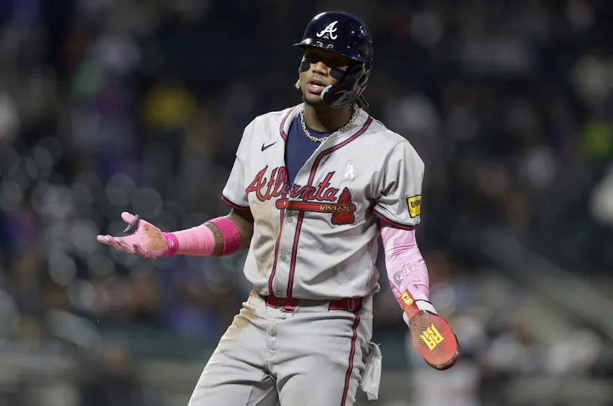 Ronald Acuna Jr. of the Atlanta Braves reacts after he was picked off at first base against the New York Mets, and we offer our top Braves vs. Cubs player props based on the best MLB odds.