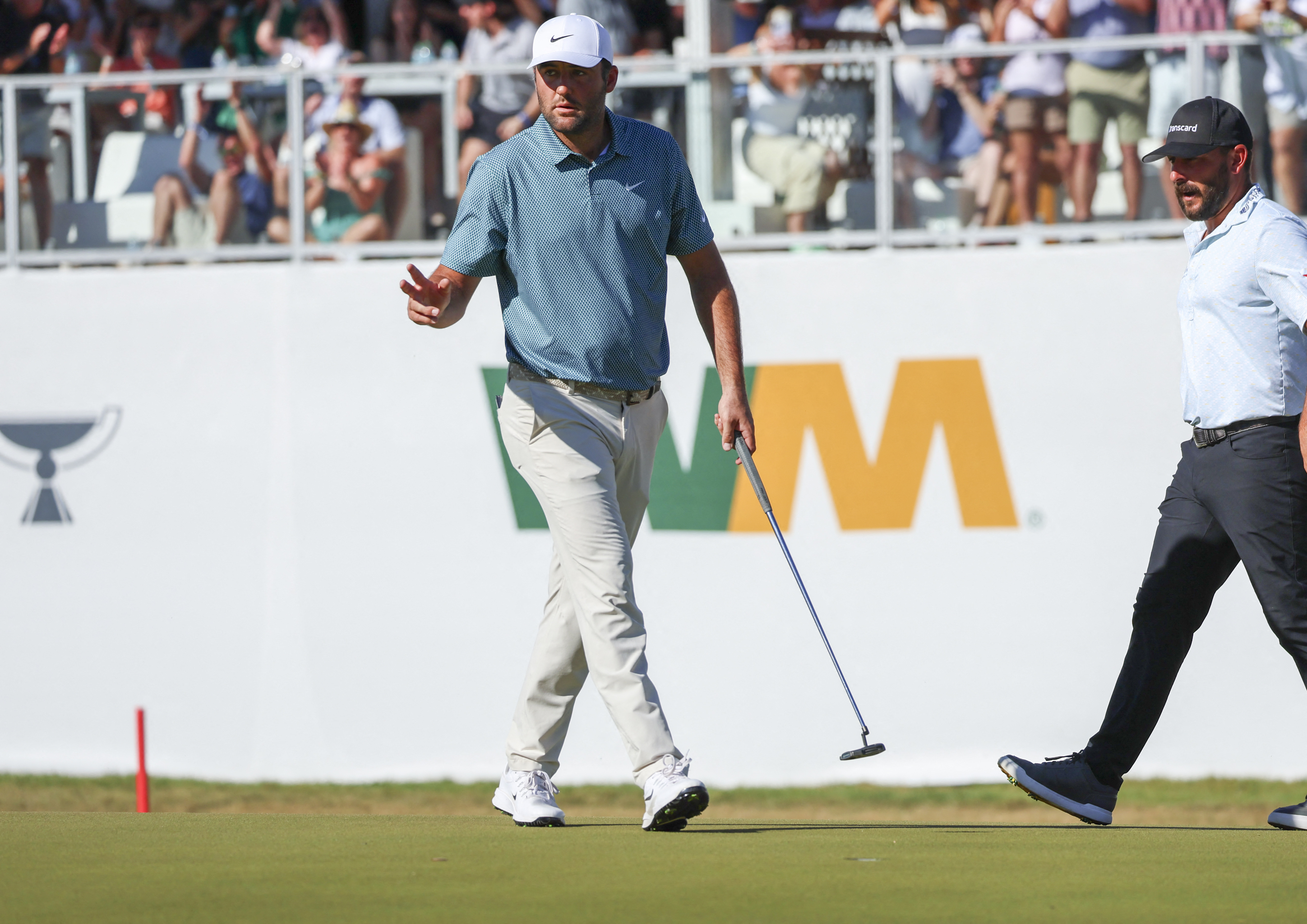 Scottie Scheffler putts on hole 17 during the final round of the WM Phoenix Open golf tournament, as we prepare for the 2027 WM Phoenix Open odds