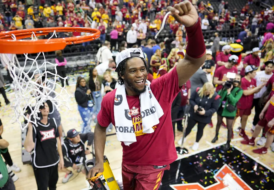 Tre King #0 of the Iowa State Cyclones cuts down the net as we look at our BetMGM bonus code for March Madness