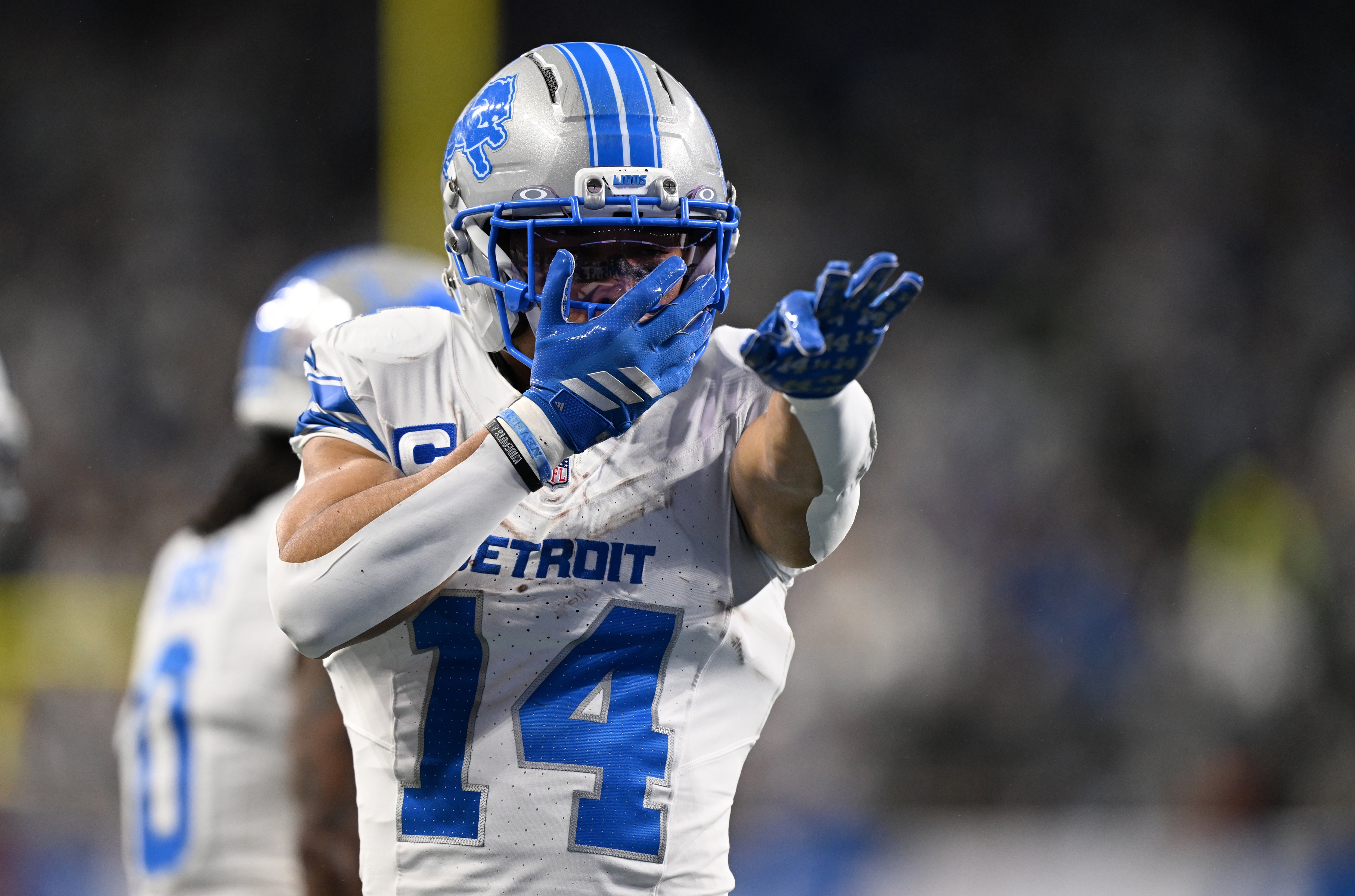 Detroit Lions wide receiver Amon-Ra St. Brown (14) celebrates as we break down our Steelers vs. Lions player props.