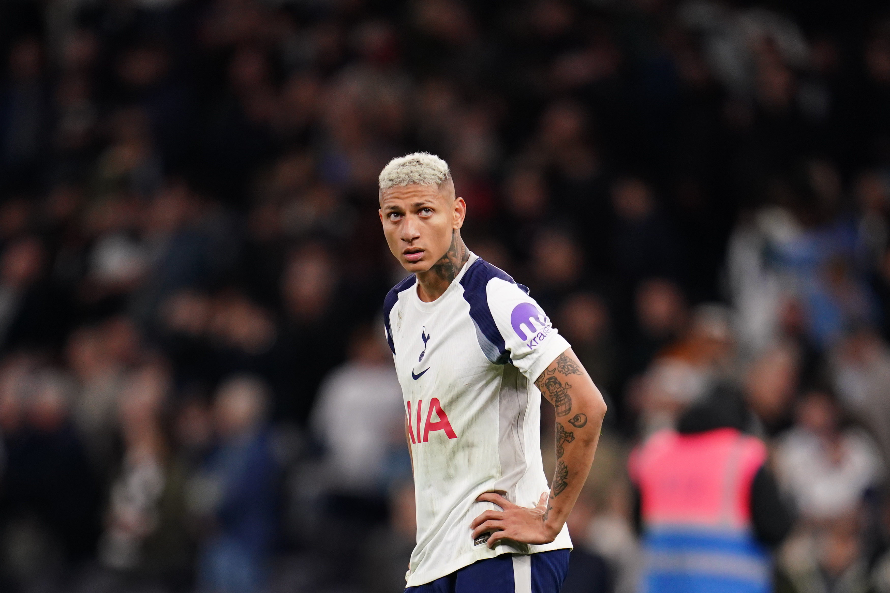 Richarlison of Tottenham Hotspur, seen here looking on during a game, is featured in our Tottenham vs. Everton prediction and odds.