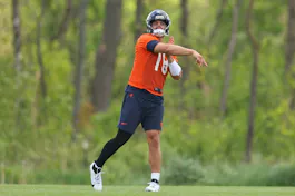 Caleb Williams of the Chicago Bears throws a pass as we look at the best NFL Week 1 odds, spreads, moneylines and totals.