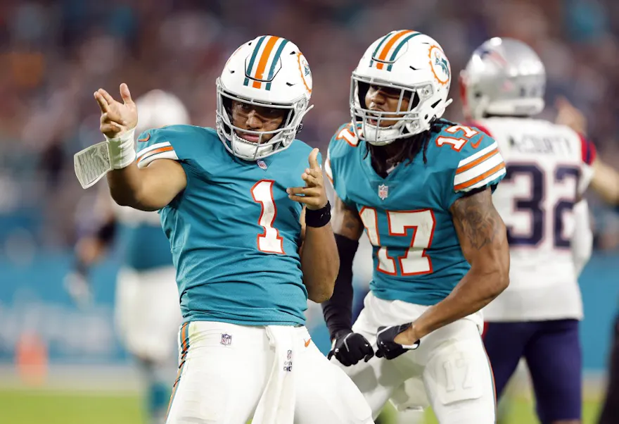 Tua Tagovailoa of the Miami Dolphins and Jaylen Waddle celebrate a first down at Hard Rock Stadium, and we offer new U.S bettors our exclusive BetRivers promo code for NFL Week 7.