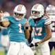 Tua Tagovailoa of the Miami Dolphins and Jaylen Waddle celebrate a first down at Hard Rock Stadium, and we offer our top odds and futures predictions for the AFC East during the 2023-24 NFL season.