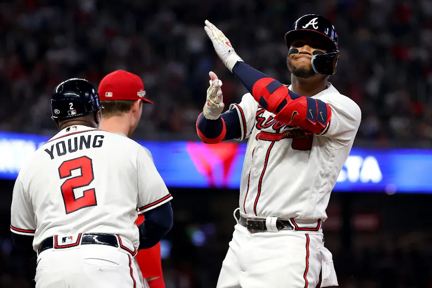 Ronald Acuna Jr. of the Atlanta Braves reacts after hitting a single against the Philadelphia Phillies in the NLDS and we offer our look at the best futures odds and predictions for the Braves in 2023.