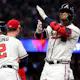  Ronald Acuna Jr. of the Atlanta Braves reacts after hitting a single against the Philadelphia Phillies in the NLDS and we offer our look at the best futures odds and predictions for the Braves in 2023.
