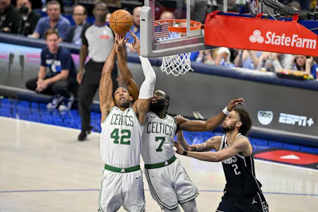 Boston Celtics center Al Horford and guard Jaylen Brown and Dallas Mavericks center Dereck Lively II battle for the ball as we look at our Mavericks vs. Celtics NBA player props for Game 5