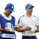 Rory McIlroy of Northern Ireland and team Europe talks with his caddie as we look at our best Ryder Cup picks