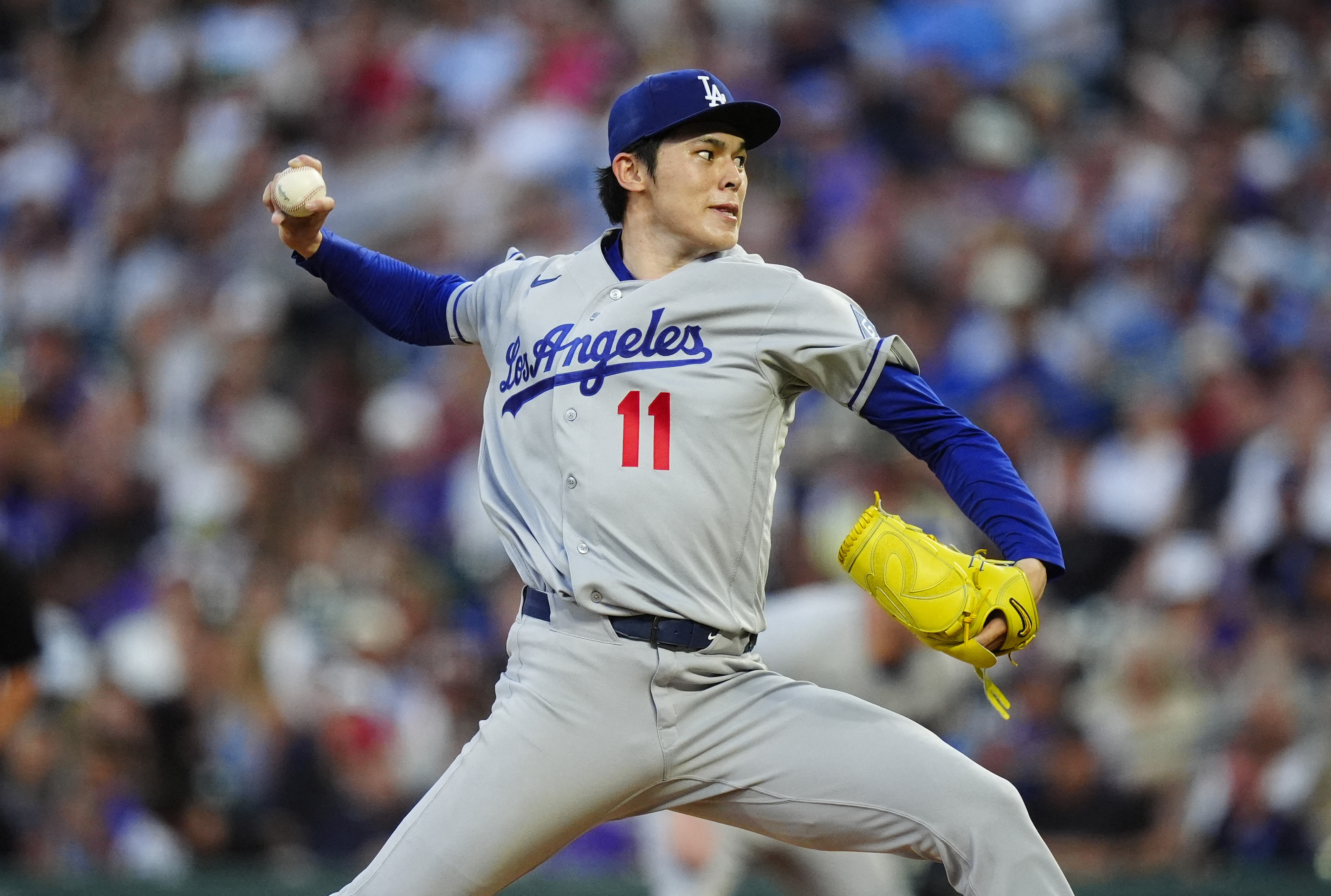 Los Angeles Dodgers starting pitcher Roki Sasaki (11) delivers a pitch as we break down our best NRFI bets today.