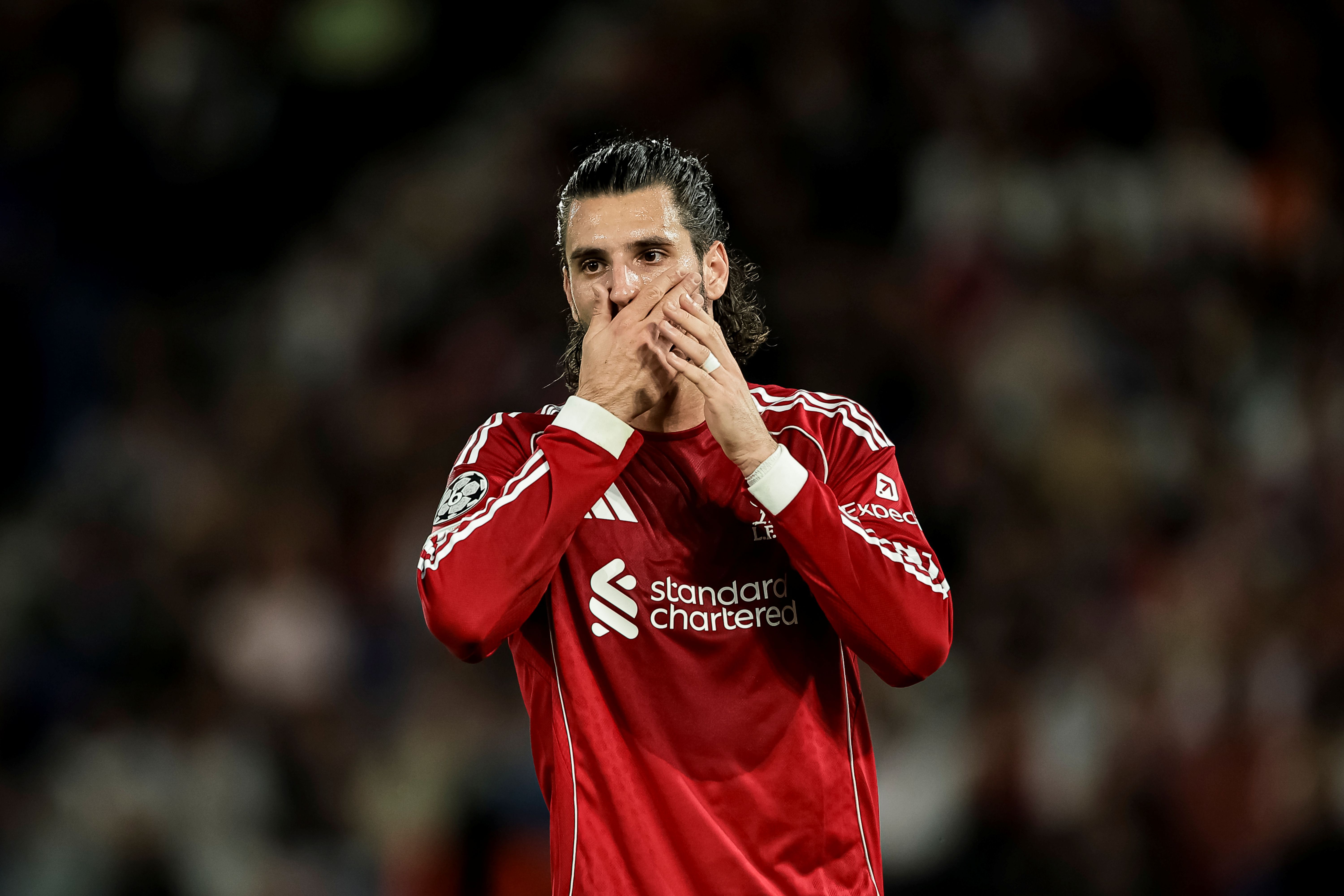 Dominik Szoboszlai of Liverpool reacts as we make our best Liverpool vs. PSG prediction. 