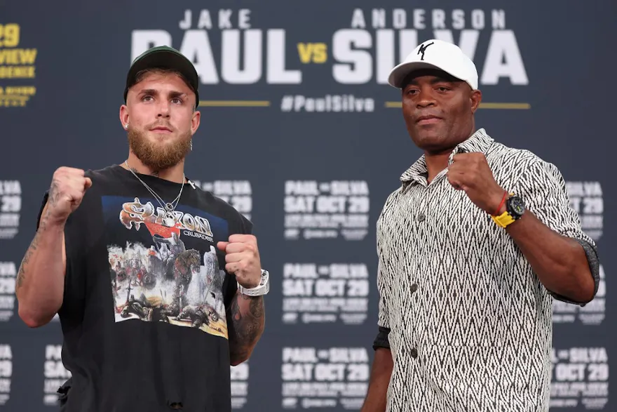 Jake Paul and Anderson SIlva pose together during a Jake Paul v Anderson Silva press conference at Gila River Arena on September 13, 2022 in Glendale, Arizona.