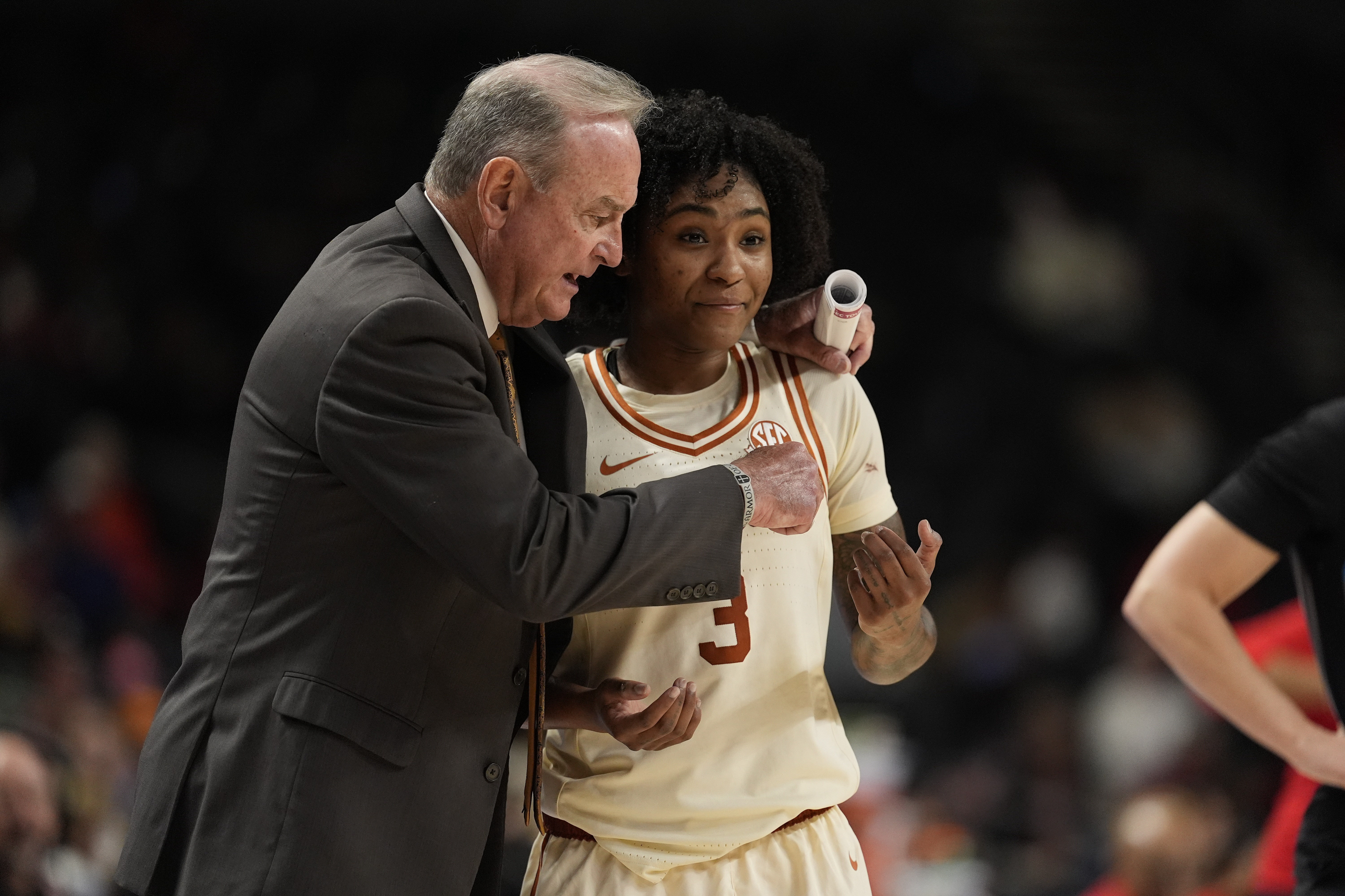 Texas head coach Vic Schaefer talks with guard Rori Harmon (3) as we look at our Texas vs. South Carolina prediction