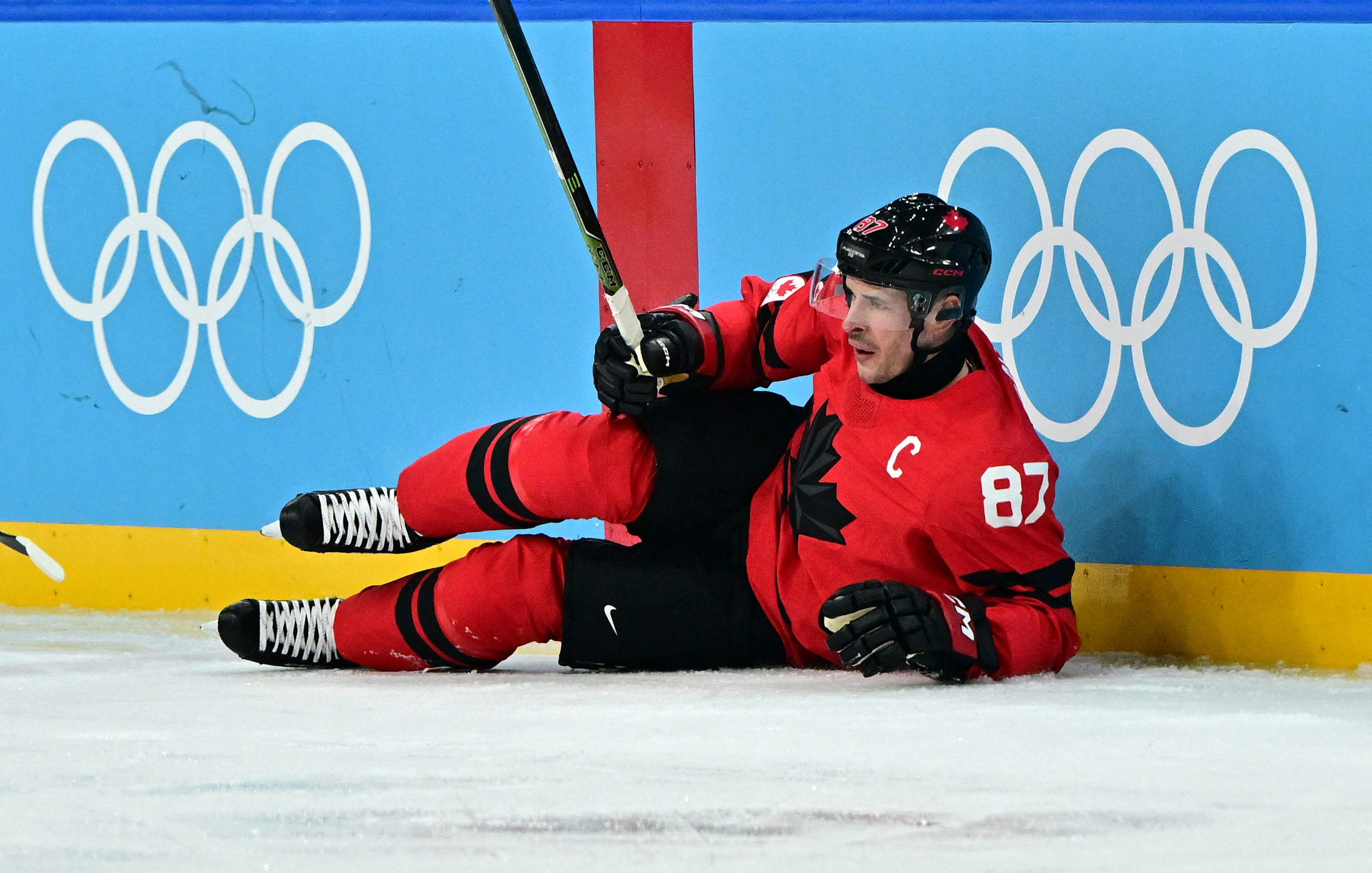 Canada's Sidney Crosby lies on the ice after sustaining an injury as we provide the latest Sidney Crosby injury update.
