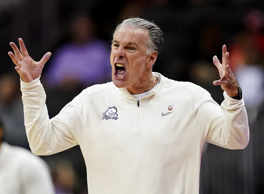 Head coach Jamie Dixon of the TCU Horned Frogs yells to his team as we look at our best TCU vs. Houston prediction for the Big 12 Tournament