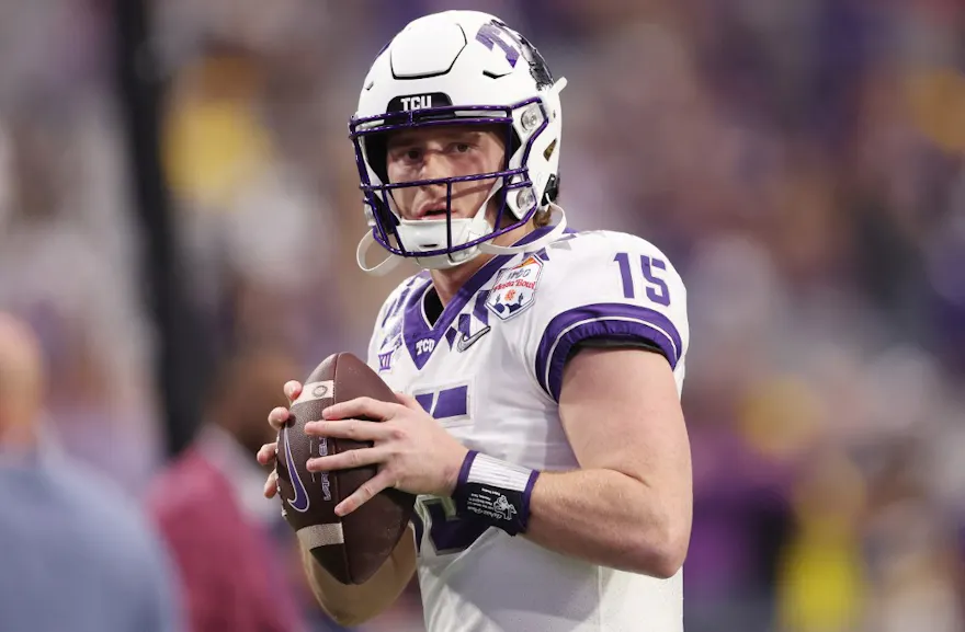 Max Duggan #15 of the TCU Horned Frogs warms up prior to the game against the Michigan Wolverines in the Vrbo Fiesta Bowl at State Farm Stadium on December 31, 2022 in Glendale, Arizona. 