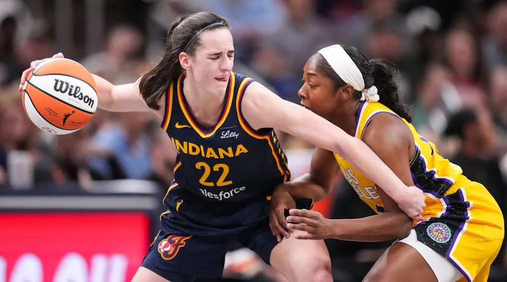 Indiana Fever guard Caitlin Clark (22) rushes up the court as we offer our best Sparks vs. Fever prediction and expert picks for Wednesday's WNBA matchup at Gainbridge Fieldhouse in Indianapolis.