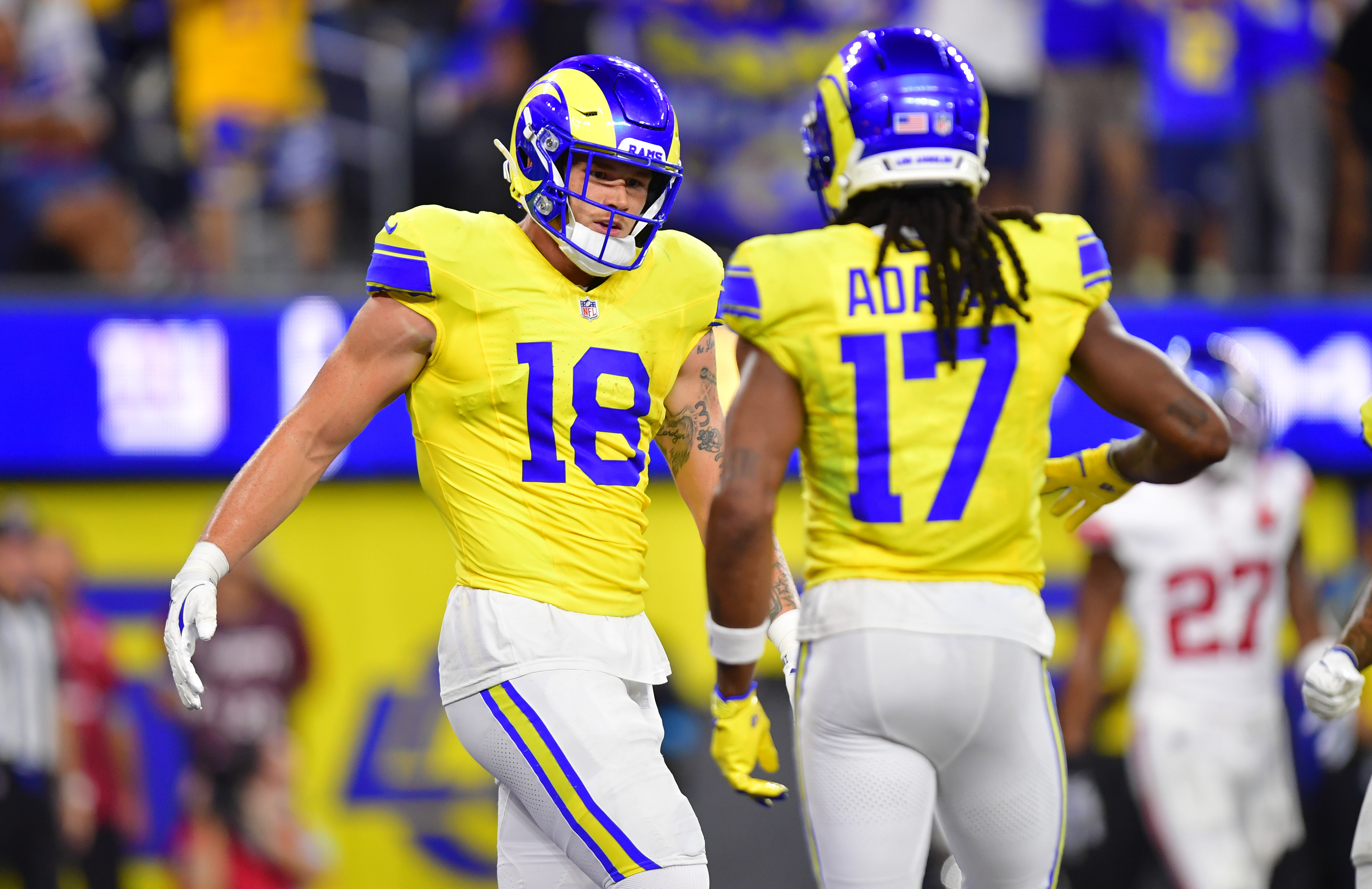 Rams tight end Terrance Ferguson (18) celebrates with wide receiver Davante Adams (17) as we break down our Rams vs. Broncos expert picks.