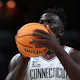 Adama Sanogo of the Connecticut Huskies prepares to take a free throw as we look at the March Madness MVP odds