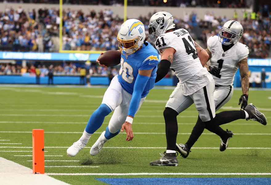 Justin Herbert #10 of the Los Angeles Chargers rushes for a touchdown as we look at our anytime touchdown scorer predictions for Week 9
