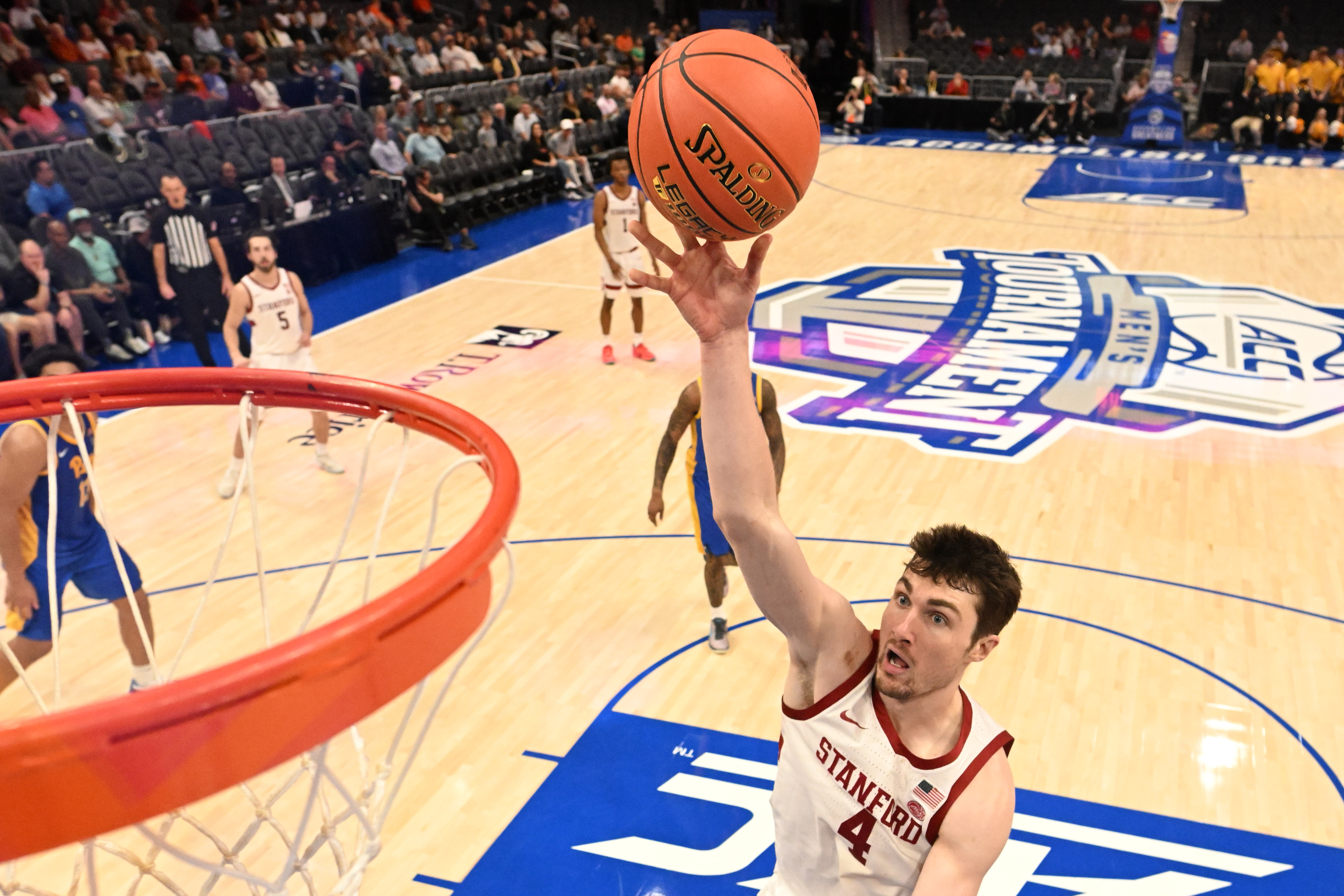 Stanford Cardinal forward AJ Rohosy shoots as we make our best Stanford vs. West Virginia prediction.