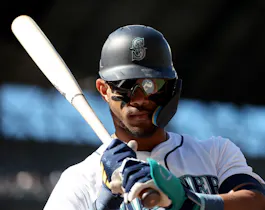 Julio Rodriguez of the Seattle Mariners stands on deck during the fifth inning against the Cincinnati Reds, and we're offering our top MLB player props and expert picks for Friday based on the best MLB odds.