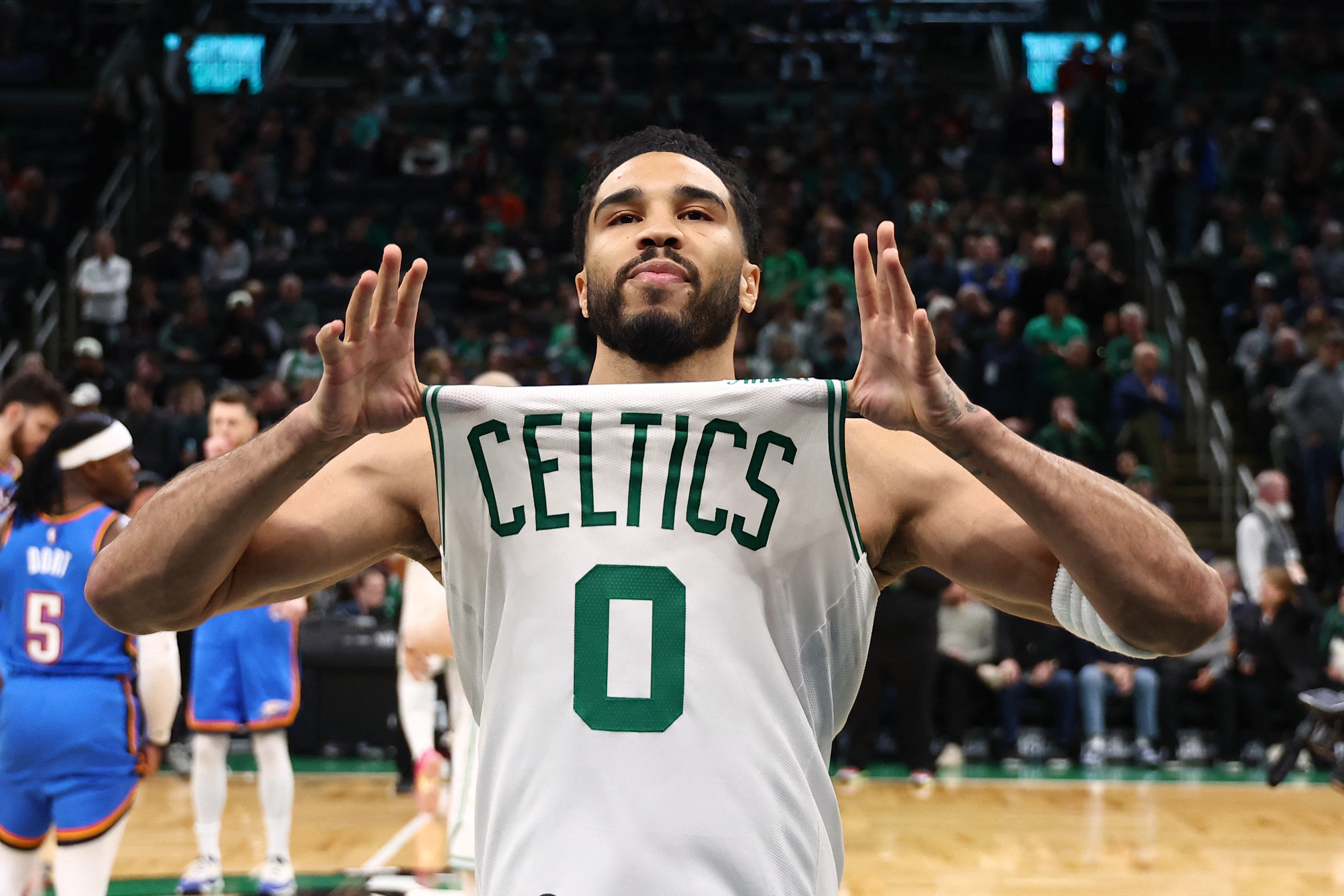 Boston Celtics forward Jayson Tatum shows off his jersey bas we offer our best NBA player props today