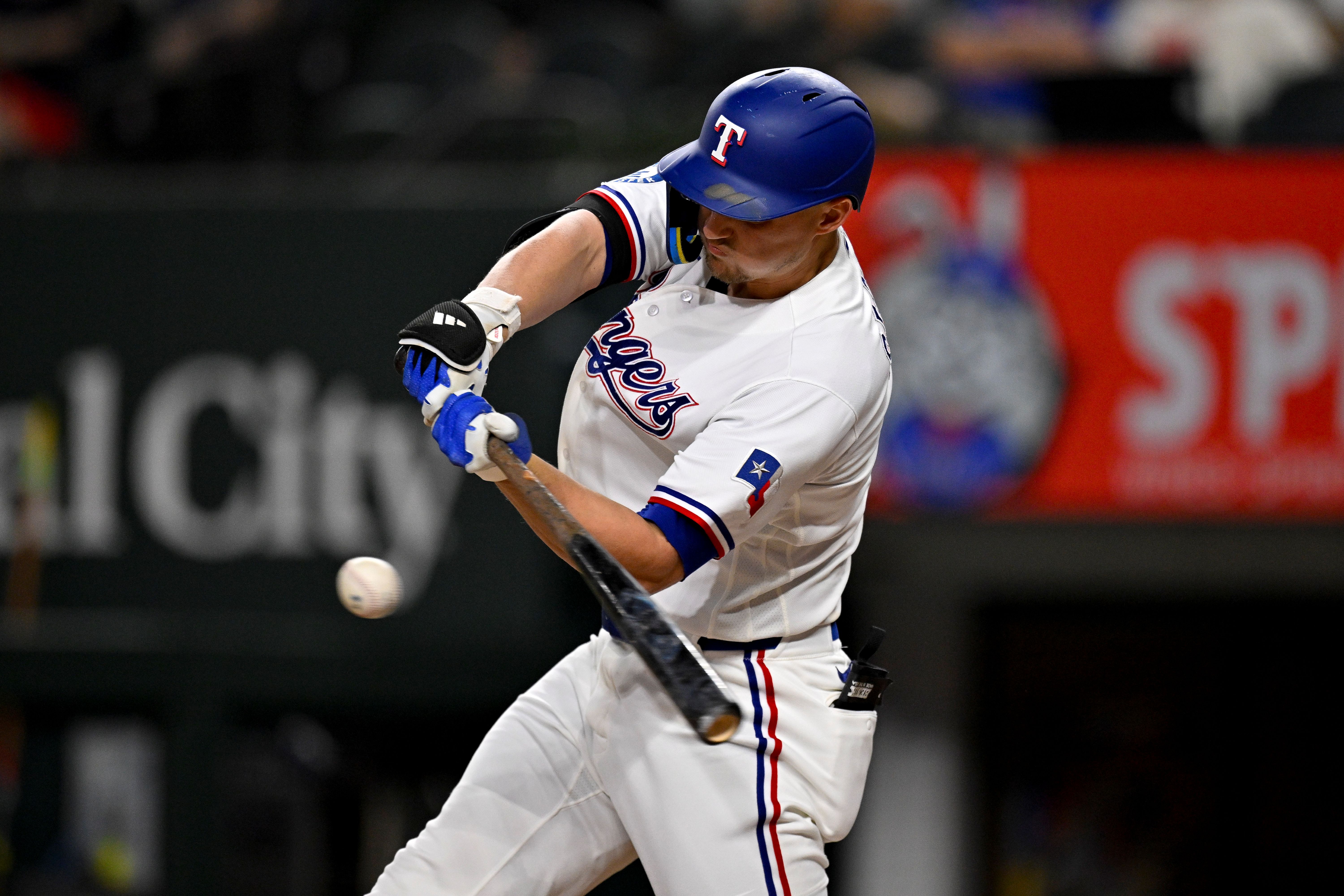Rangers shortstop Corey Seager (5) bats as we break down our home run predictions today.