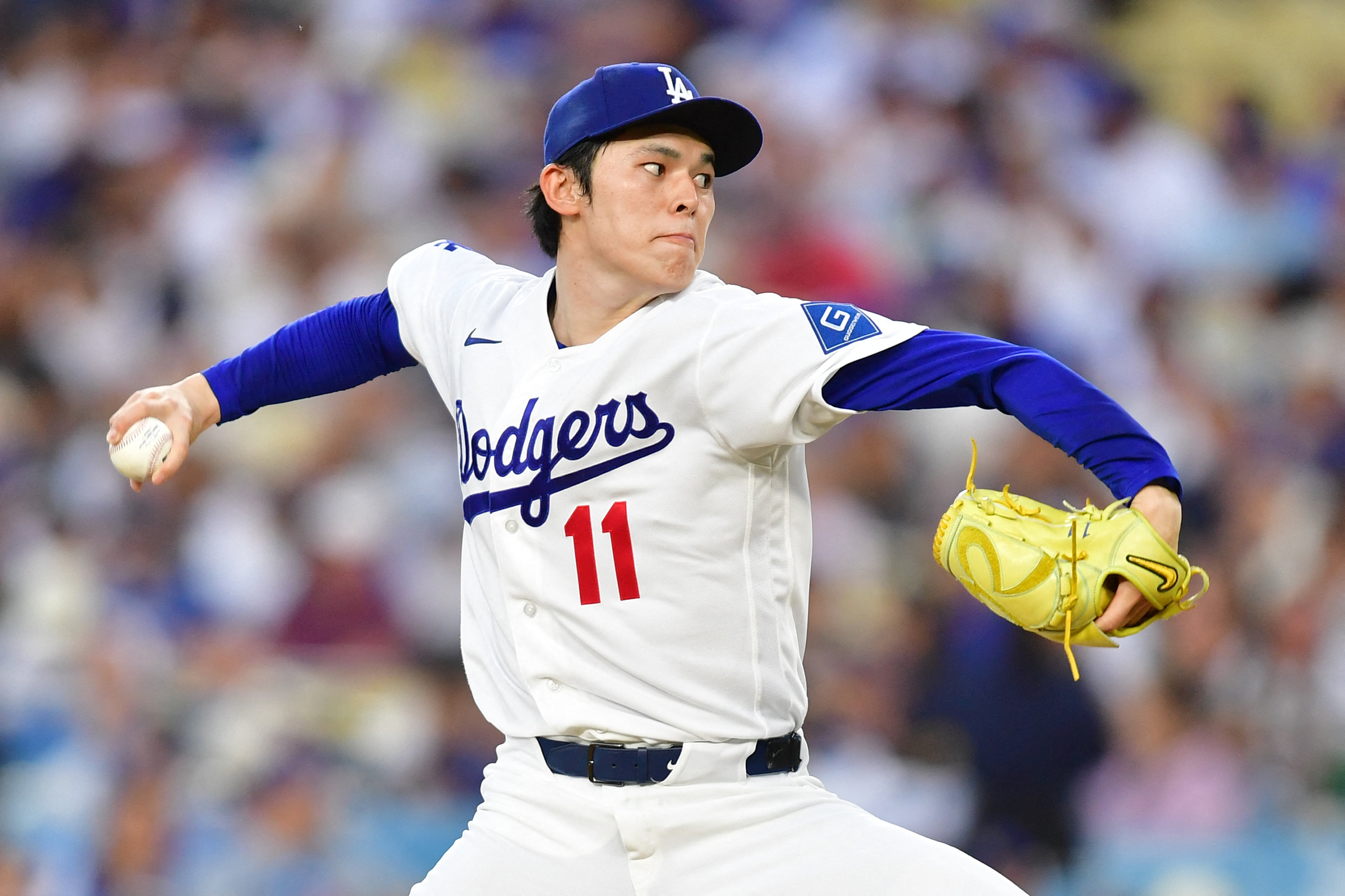 Los Angeles Dodgers pitcher Roki Sasaki (11) pitches as we break down our best NRFI bets today.