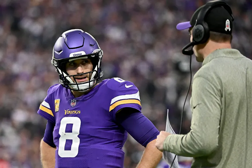 Kirk Cousins of the Minnesota Vikings talks with head coach Kevin O'Connell of the Minnesota Vikings during the first half against the Dallas Cowboys at U.S. Bank Stadium on November 20, 2022 in Minneapolis, Minnesota.