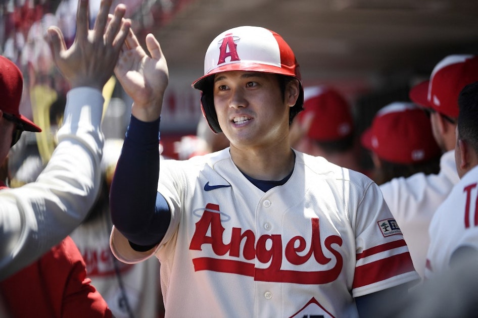 Ohtani impressive, but Giants win with 7 in 13th