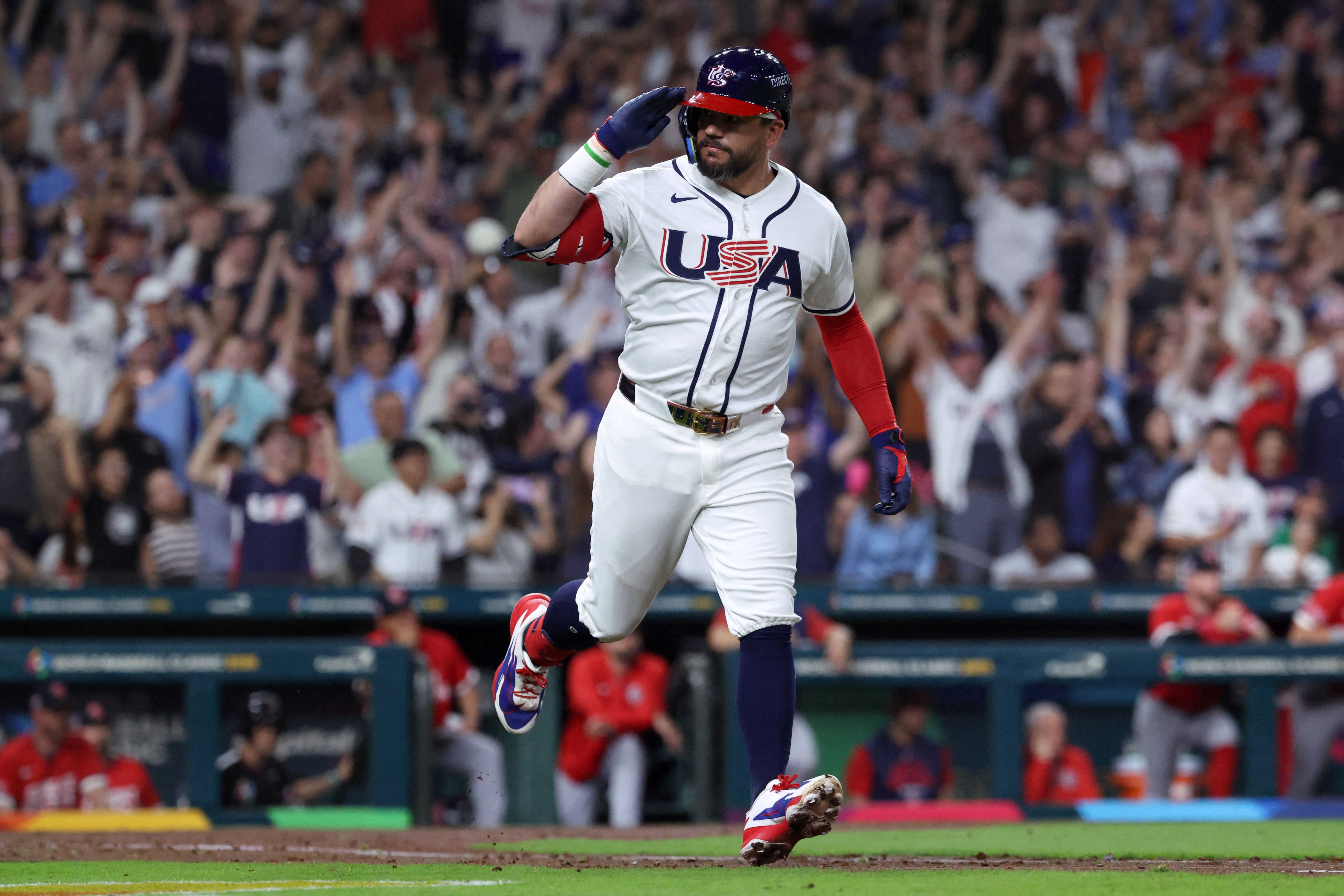 United States designated hitter Kyle Schwarber rounds the bases after hitting a two-run homer, and he's key to our United States vs. Dominican Republic predictions