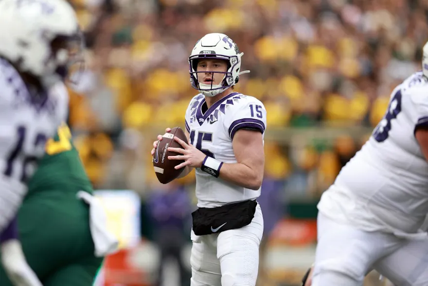 Quarterback Max Duggan of the TCU Horned Frogs looks for an open receiver against the Baylor Bears.