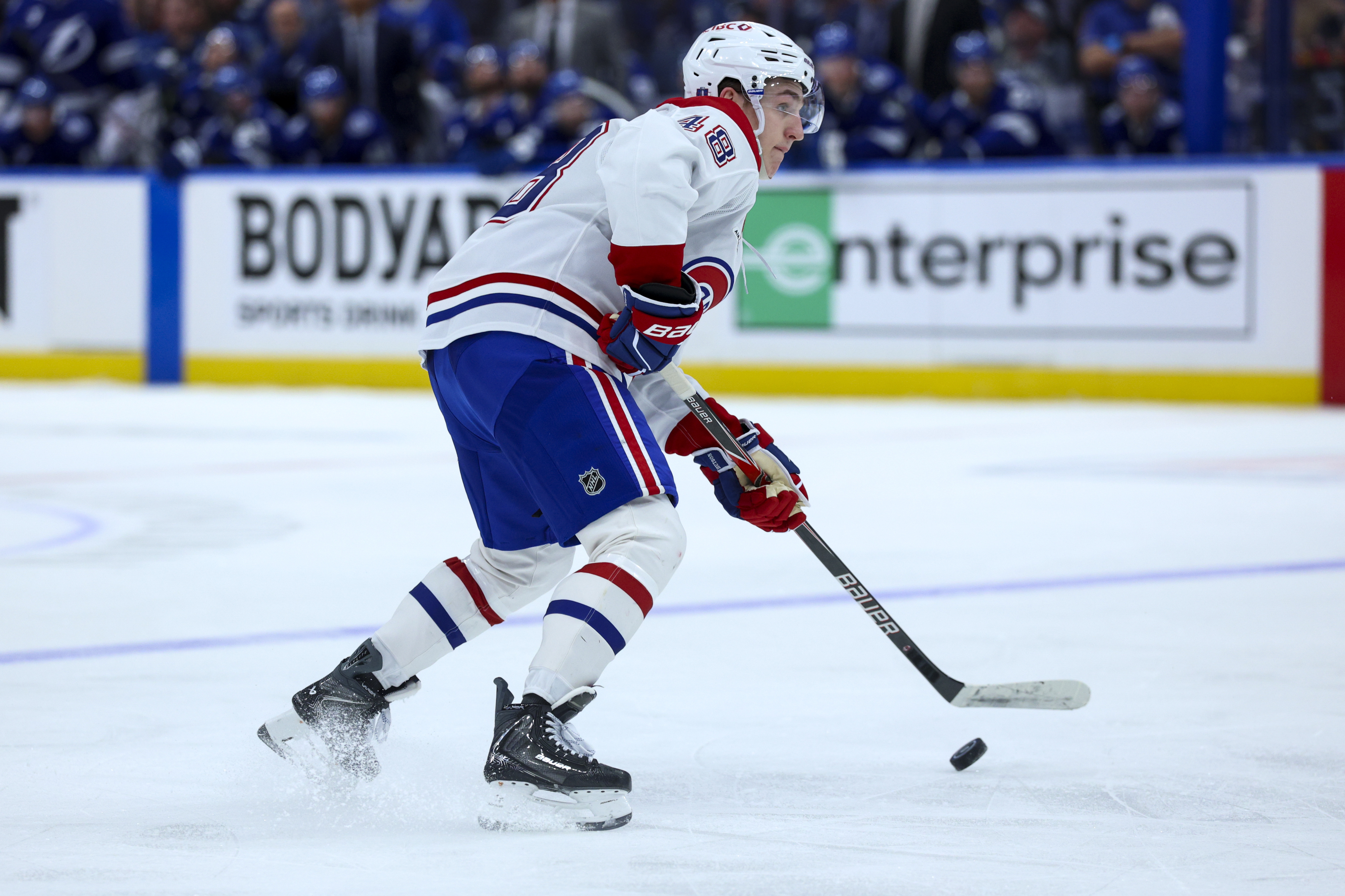 Montreal Canadiens defenseman Lane Hutson shoots the puck as we make our best Lightning vs. Canadiens prediction. 
