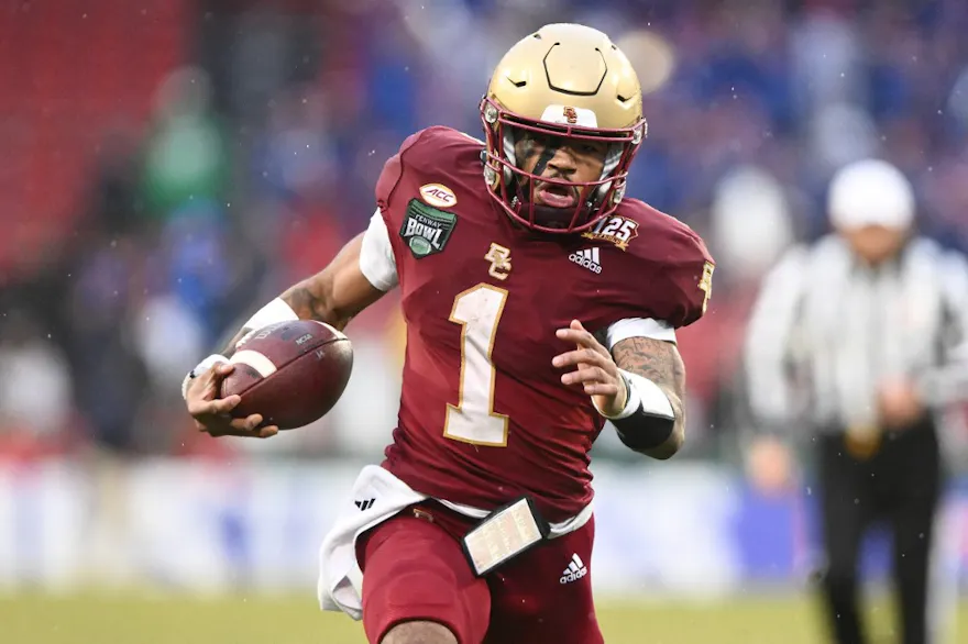 Thomas Castellanos of the Boston College Eagles rushes against the Southern Methodist Mustangs as we look at Fanatics Sportsbooks fine for violating college football betting laws in Massachusetts.