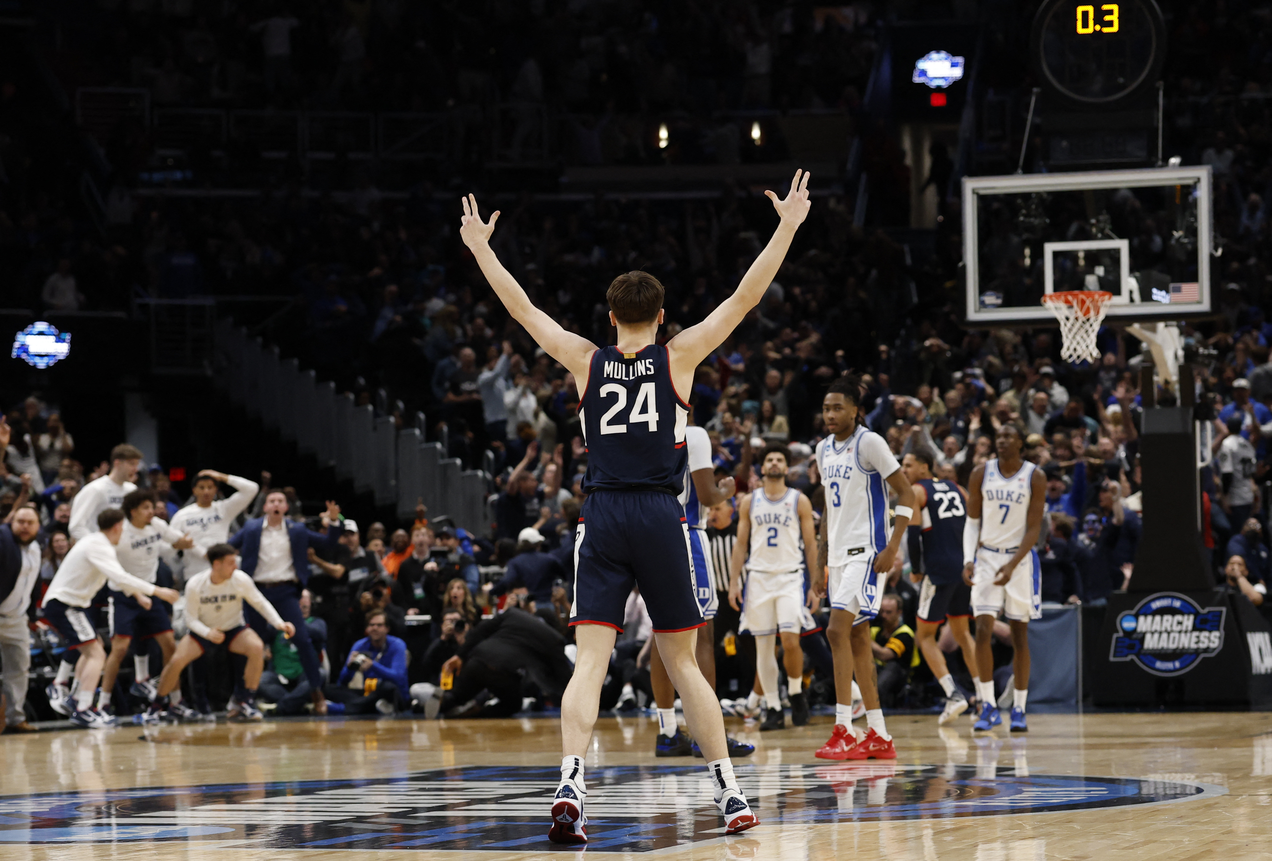 UConn's Braylon Mullins after his game-winning shot, setting up our Illinois vs. UConn prediction for the Final Four.