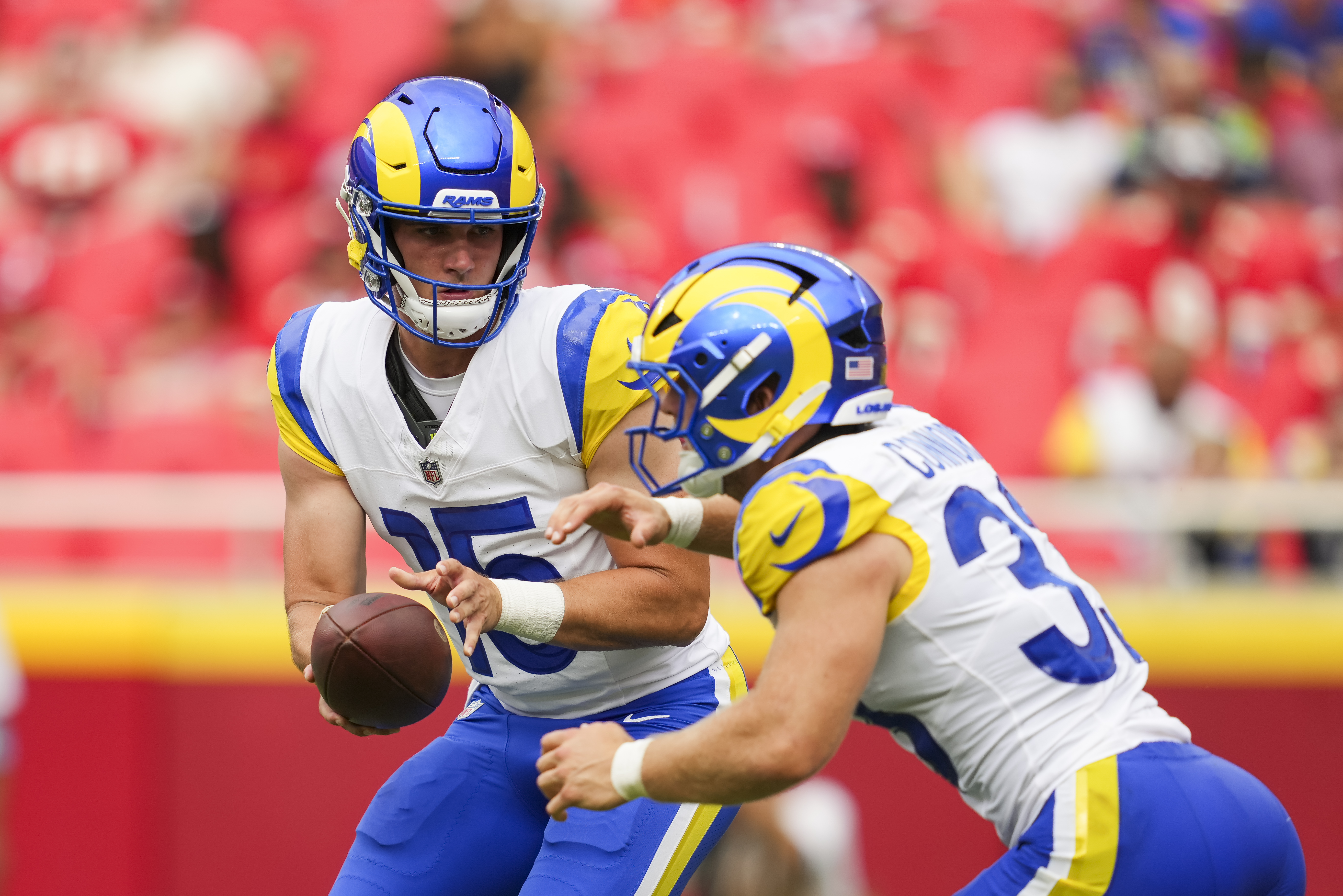Los Angeles Rams quarterback Ty Simpson hands off to running back Dean Connors as we offer our Saints vs. Rams prediction