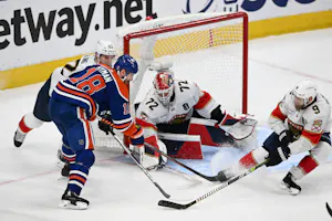 Edmonton Oilers left wing Zach Hyman shoots the puck on Florida Panthers goaltender Sergei Bobrovsky as we look at the best 2024 Stanley Cup odds