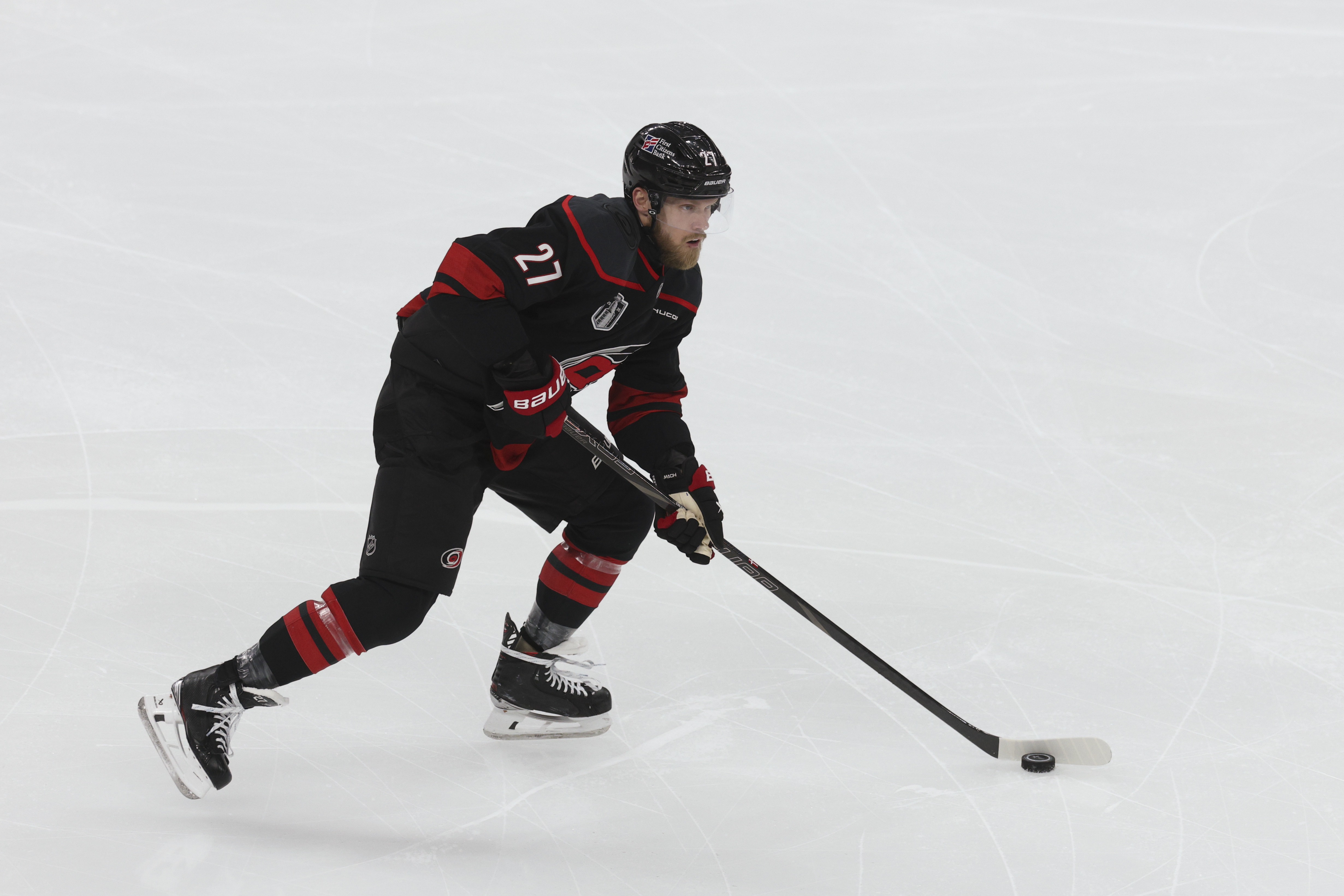 Carolina Hurricanes left wing Nikolaj Ehlers (27) skates with the puck as he is featured in our Hurricanes vs. Golden Knights prediction & odds.