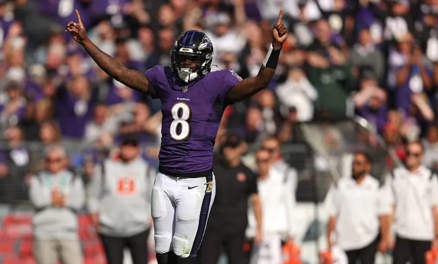 Lamar Jackson of the Baltimore Ravens celebrates a rushing touchdown by Devonta Freeman during the second quarter against the Cincinnati Bengals at M&T Bank Stadium.